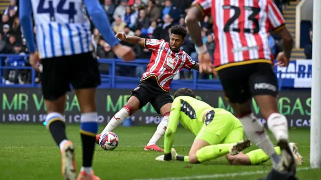 Rhian Brewster scores from close range to win the Steel City derby