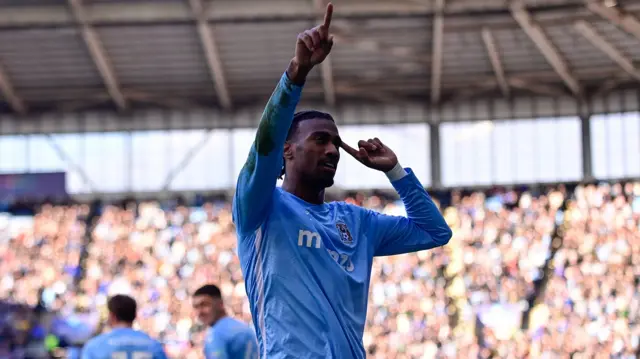 Coventry's Haji Wright points to the sky to celebrate after scoring against Sunderland