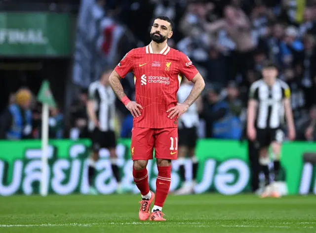 Mohamed Salah of Liverpool looks dejected