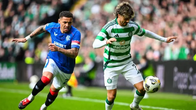 Rangers' James Tavernier and Celtic's Jota