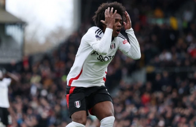 Fulham's Willian reacts after missing a chance