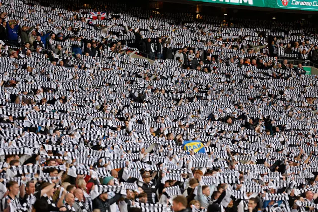 Newcastle United fans with scarves