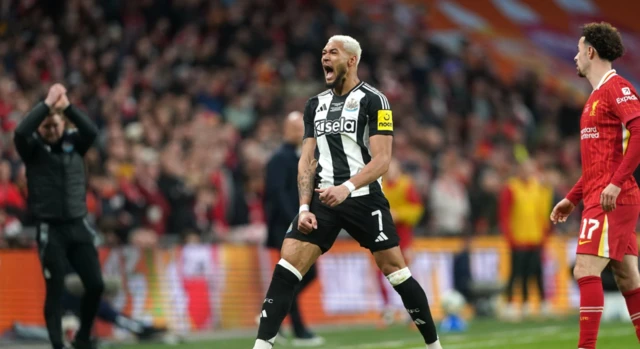 Newcastle United's Joelinton celebrates after a tackle on Liverpool's Curtis Jones (right) as Newcastle United manager Eddie Howe (left) applauds