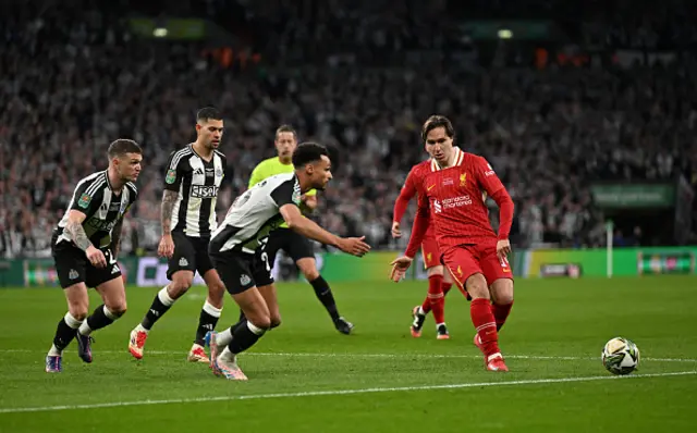 Federico Chiesa of Liverpool passes the ball