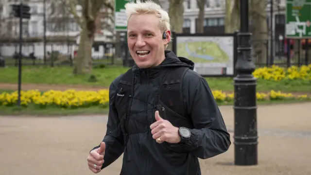 Jamie's still upbeat as he enters the famous Hyde Park