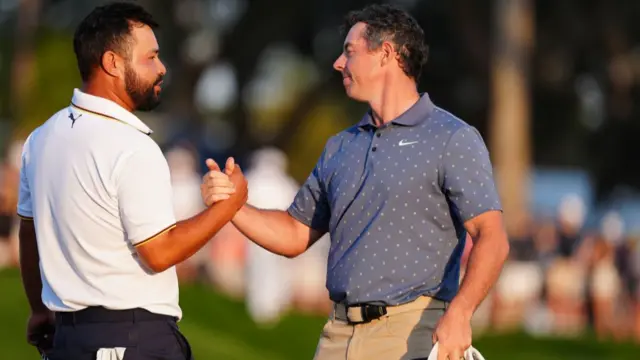 JJ Spaun and Rory McIlroy