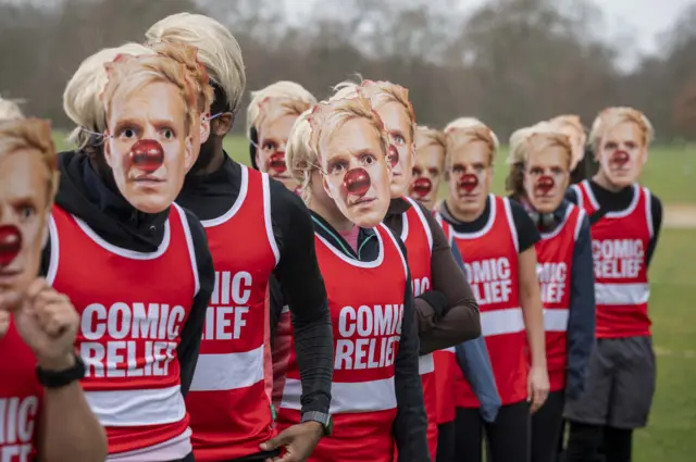 A sea of Jamie Laing supporters all don lookalike masks in London's Hyde Park