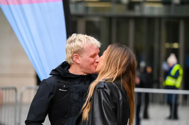Jamie Laing embracing wife Sophie at the starting line of his Comic Relief challenge