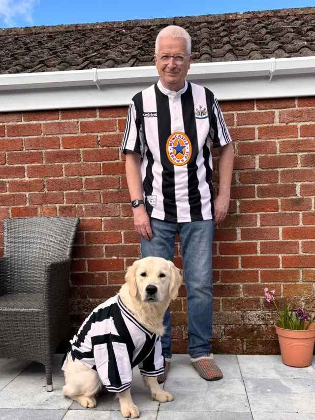 Newcastle fan with dog