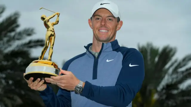 Rory McIlroy with The Players Championship trophy