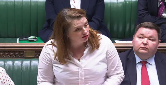 Alison McGovern speaks in the Commons, with MPs sitting behind her