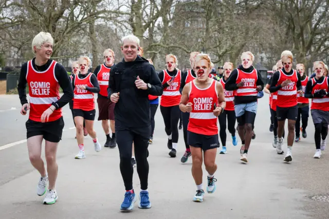 Jamie Laing runs with many lookalics