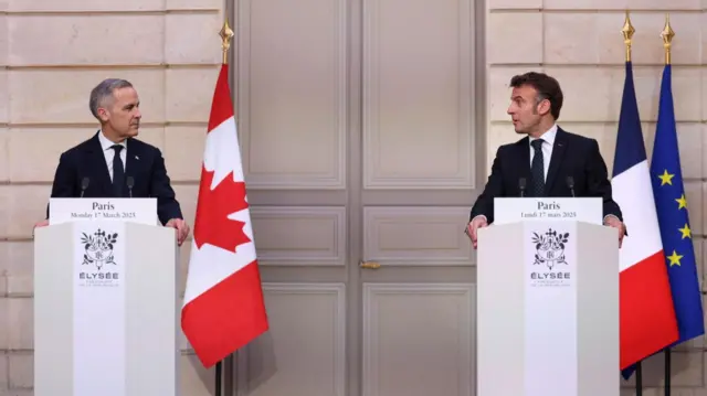 French President Emmanuel Macron and Canadian Prime Minister Mark Carney hold a press conference at the Elysee Palace in Paris