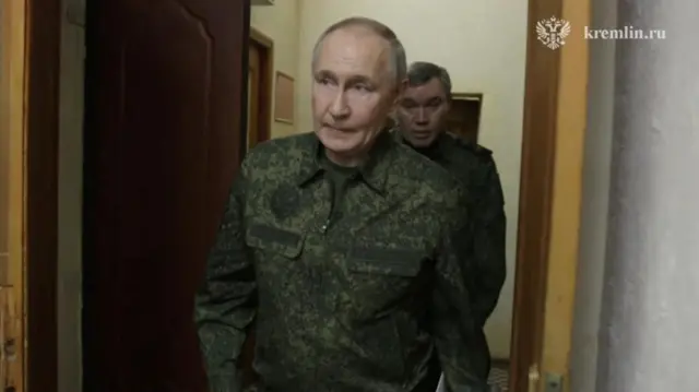 Russian President Vladimir Putin walks ahead of Chief of the General Staff of Russian Armed Forces Valery Gerasimov as he visits the army command centre in the course of Russia-Ukraine conflict in the Kursk region, Russia, March 12, 2025