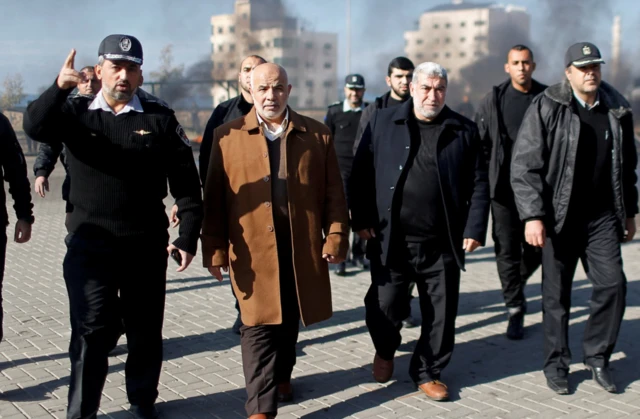 Tawfiq Abu Naeem, head of Hamas-run security forces, and his deputy Mahmoud Abu Watfa arrive to attend a training session by police recruits in Gaza City in January 2020.