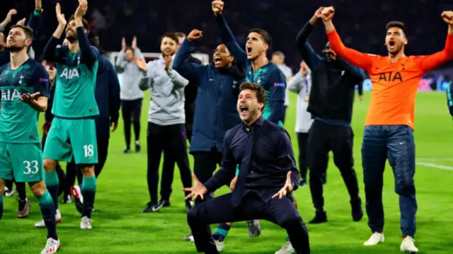 Pochettino celebrating with the traveling Spurs fans