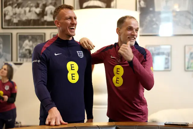 Thomas Tuchel, Head Coach of England, greets Dan Burn