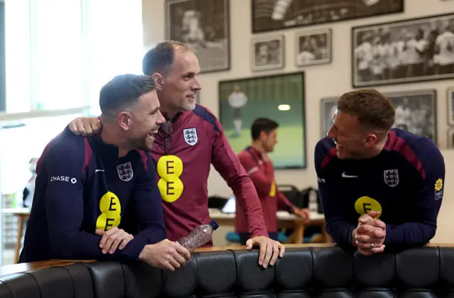 Thomas Tuchel, Head Coach of England, greets Jordan Henderson and Dan Burn