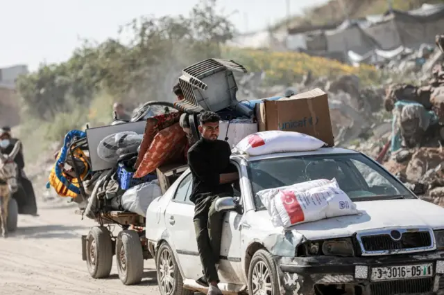 Palestinians in Beit Lahia, northern Gaza, earlier today