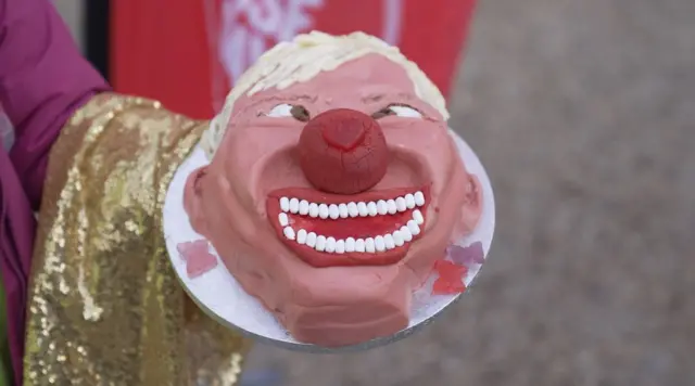 A cake in the shape of Jamie Laing's face