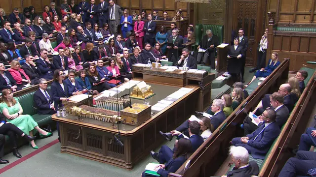 MPs in the House of Commons listening to a speech by Liz Kendall