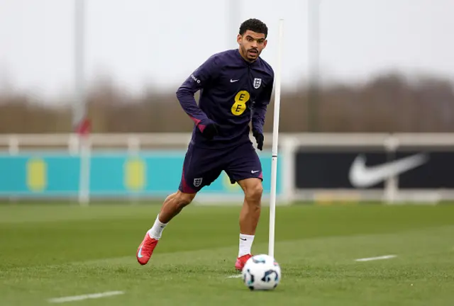 Morgan Gibbs-White of England runs with the ball