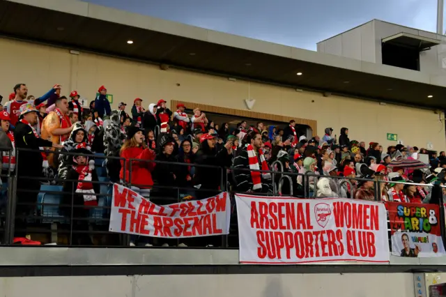 Fans of Arsenal FC show their support.