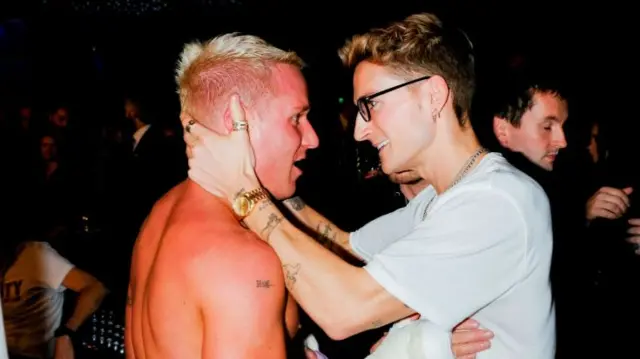 Oliver Proudlock holds Jamie Laing's head after Jamie fights in a charity boxing match The Rumble
