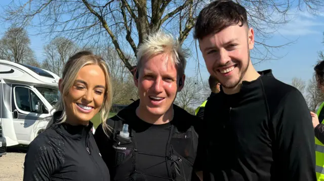 Jamie posing for a photo with Leanne and Jake from The Traitors