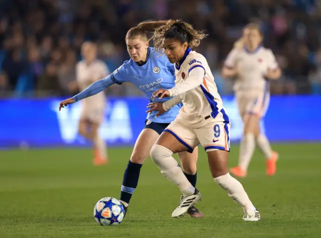 Catarina Macario of Chelsea is challenged by Jess Park