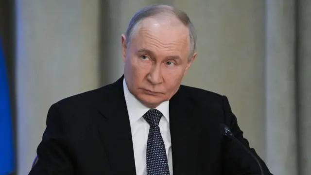 Putin wearing a suit