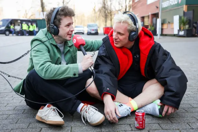Matt interviews Jamie whilst the pair sit on the floor