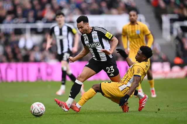 Jacob Murphy of Newcastle United is fouled by Tariq Lamptey