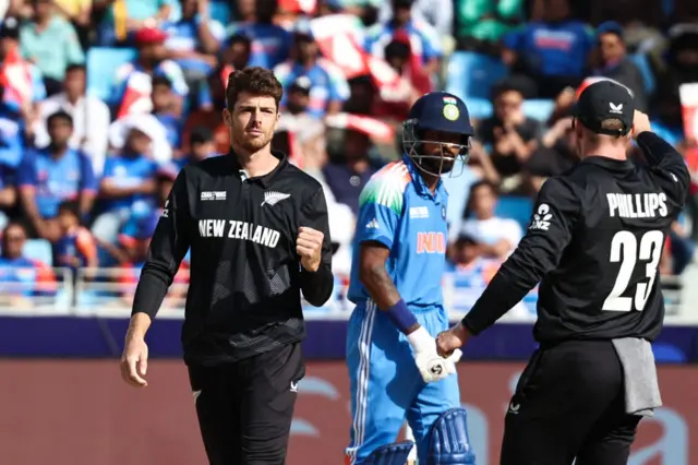 Mitch Santner celebrates the wicket of KL Rahul