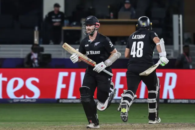 Kane Williamson and Tom Latham run between the wickets