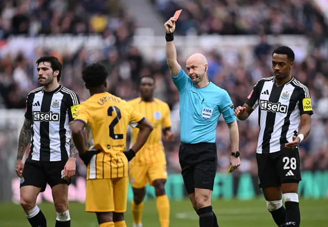 Tariq Lamptey is shown a red card