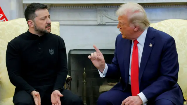 Trump sits facing Zelensky. The president faces towards Zelensky with his finger pointing towards him