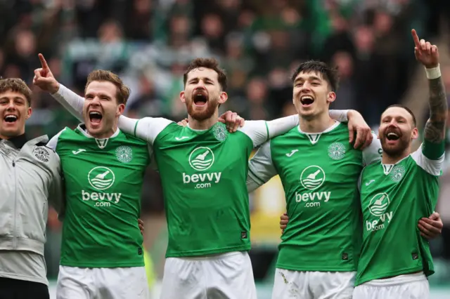 Hibs players join in with the fans' singing Sunshine on Leith