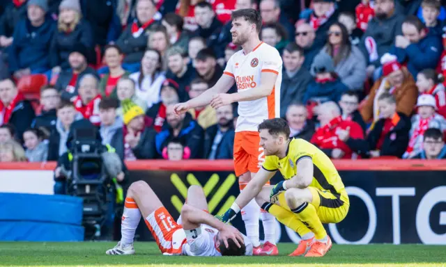 Declan Gallagher lays stricken on the floor