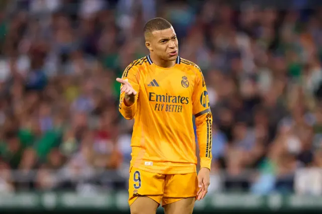 Kylian Mbappe gesturing with his hand