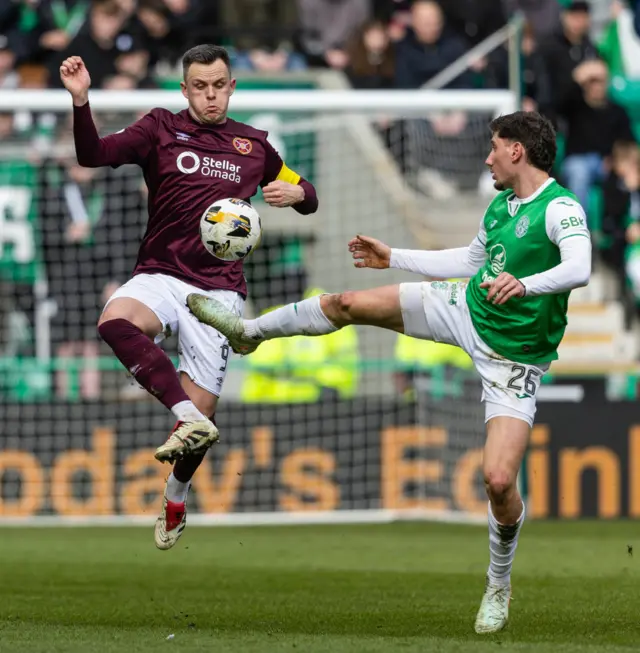 Lawrence Shankland (left) has been lively for Hearts