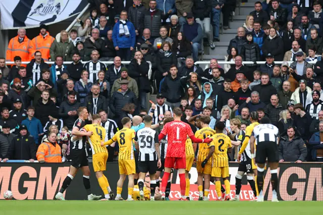 Referee, Anthony Taylor shows a red card to Anthony Gordon