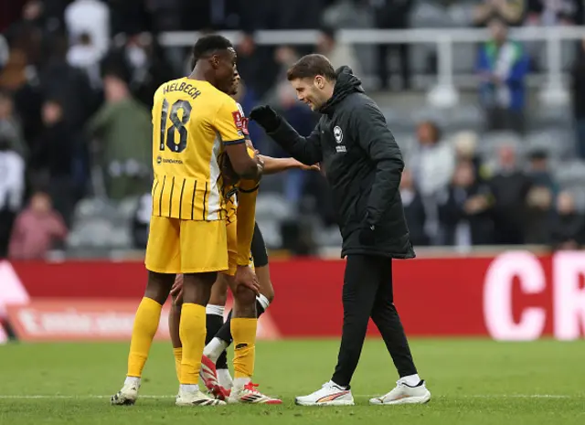 Fabian Huerzeler, Manager of Brighton & Hove Albion, celebrates with Danny Welbeck