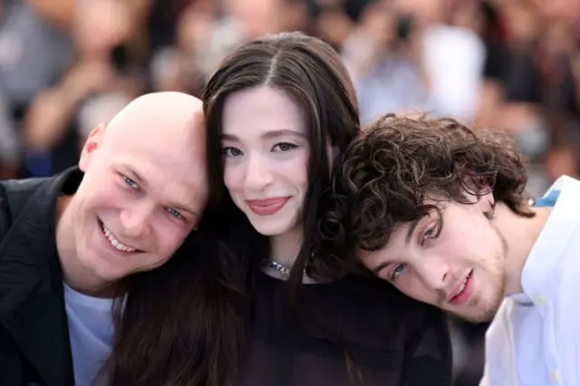 The stars of Anora (Yura Borisov, Mikey Madison and Mark Eydelshteyn) at the Cannes Film Festival 2024