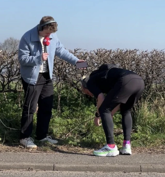 Jamie Laing is sick on the side of a road