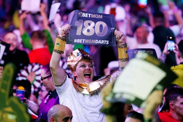 A Darts fan in fancy dress during night seven of the BetMGM Premier League at Utilita Arena, Cardiff.