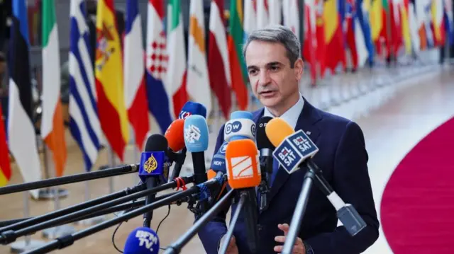 Greek Prime Minister Kyriakos Mitsotakis talks to the press as he attends a European Union summit in Brussels, Belgium March 20, 2025.