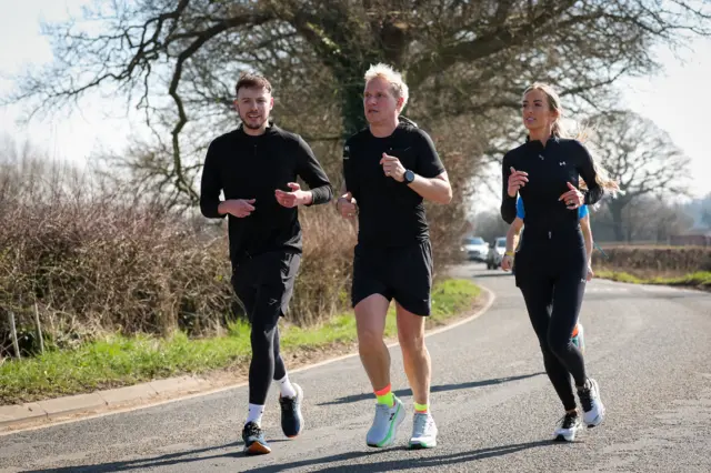 Jamie Laing runs with Leanne and Jake from The Traitors