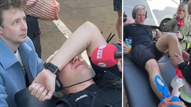 Jamie lying on a massage table in pain whilst Matt Edmondson and Charlie Hedges look concerned.