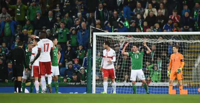 Corry Evans is penalised for a handball